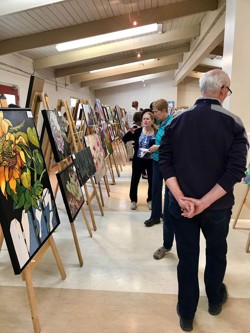 Show goers explore From the Easel's annual show and sale