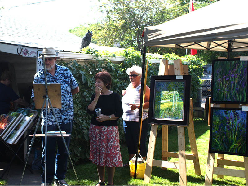 Photo of people enjoying Art in the Garden