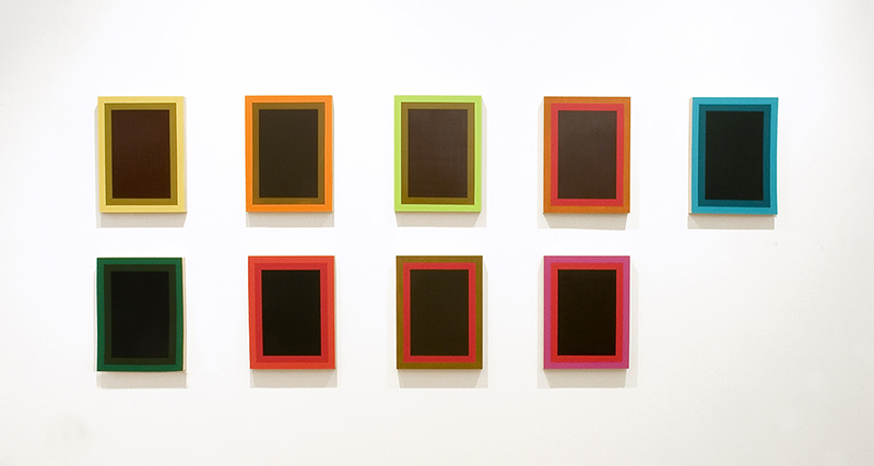 Nelson Henricks' Lacuna features brightly coloured rectangles on a wall