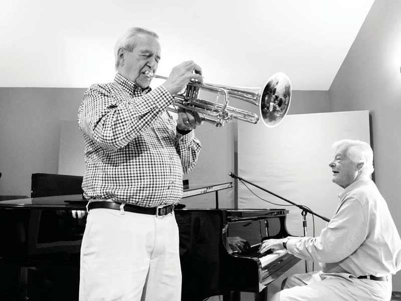 A black and white photo of Al Muirhead on trumpet and Tommy Banks on piano