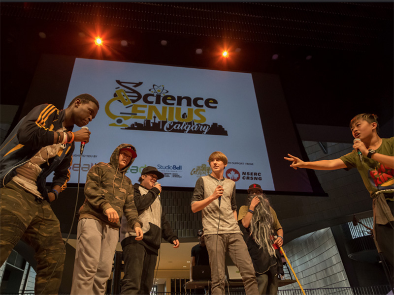 Photo of particpants on stage at the Science Genius Rap Battles
