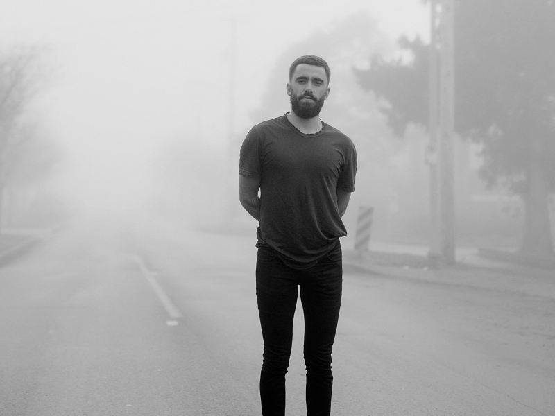 Photo of Michael Bernard Fitzgerald in fog on a empty road