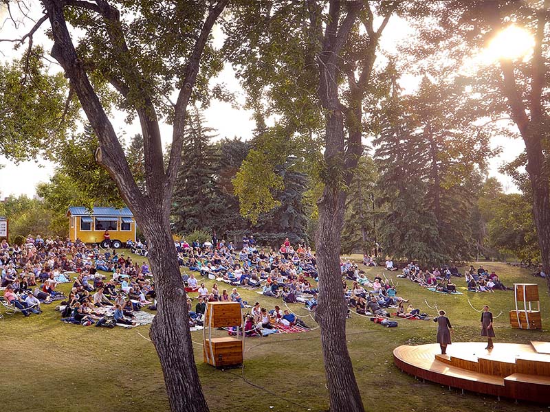 The audience at a performance of Shakespeare by the Bow in Prince's Island Park