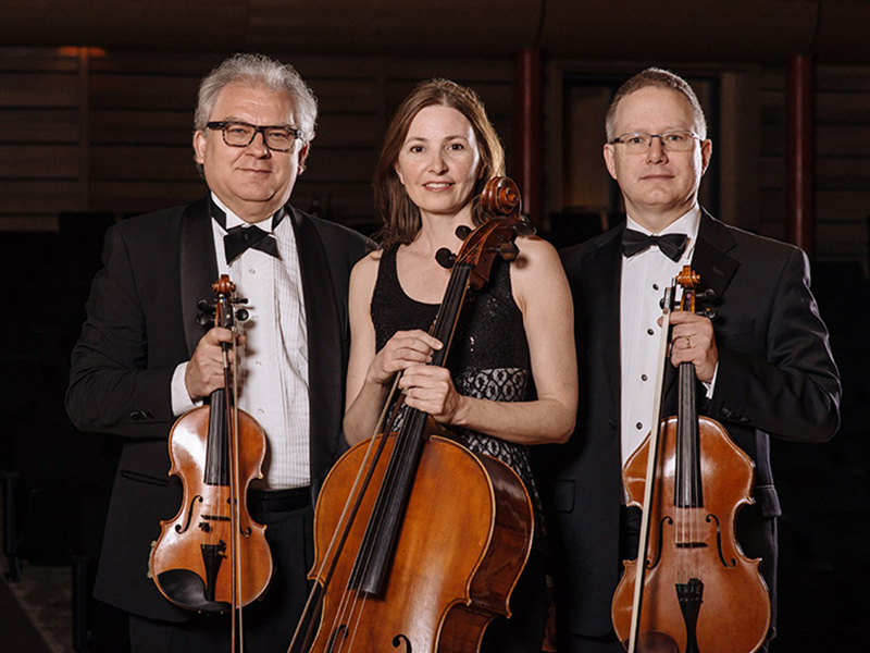 A photo of three members of the UCalgary String Quartet
