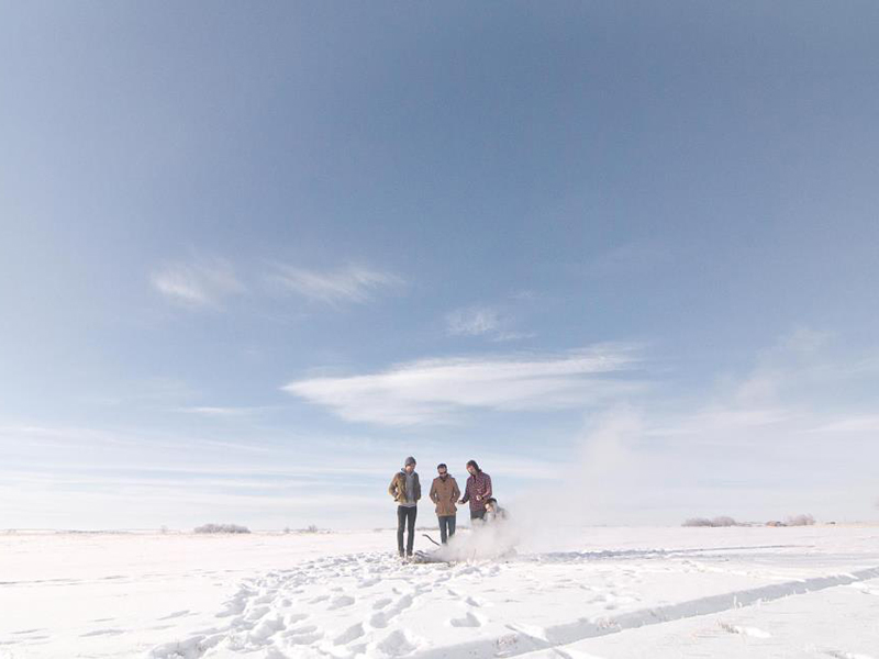 A photo of the Calgary band Cold Water in a snowy winterscape