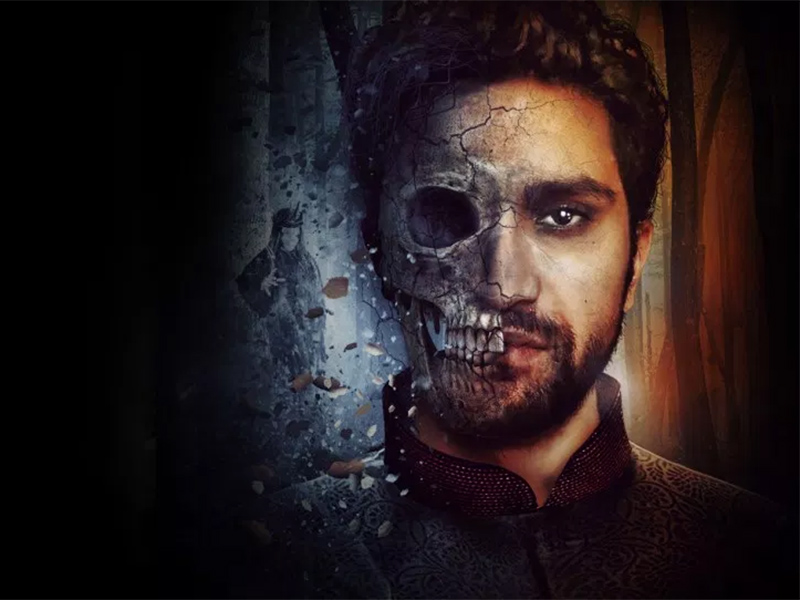 A graphic with a skull superseded over Hamlet's face