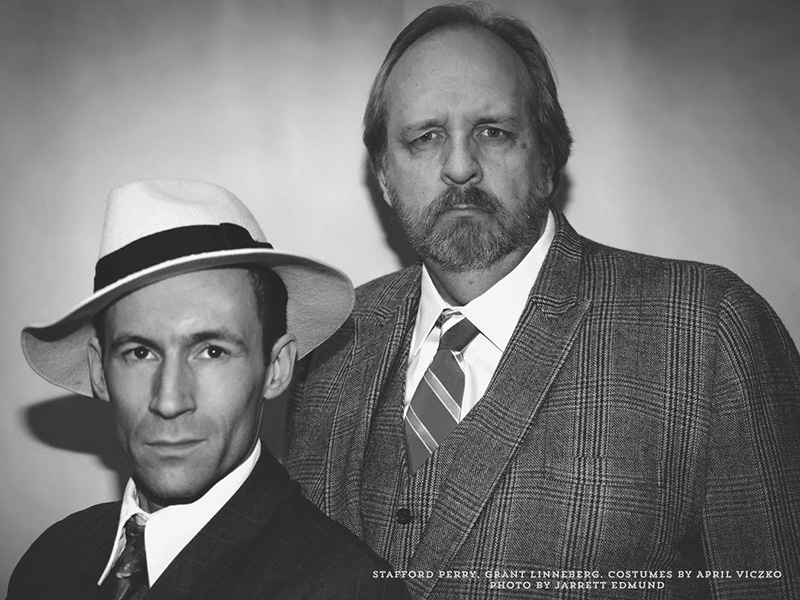 A black and white photo of Stafford Perry and Grant Linneberg in Might As Well Be Dead: A Nero Wolfe Mystery