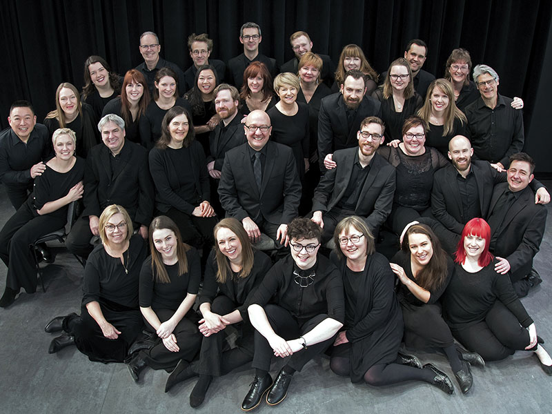 A photo of Spiritus Chamber Choir members