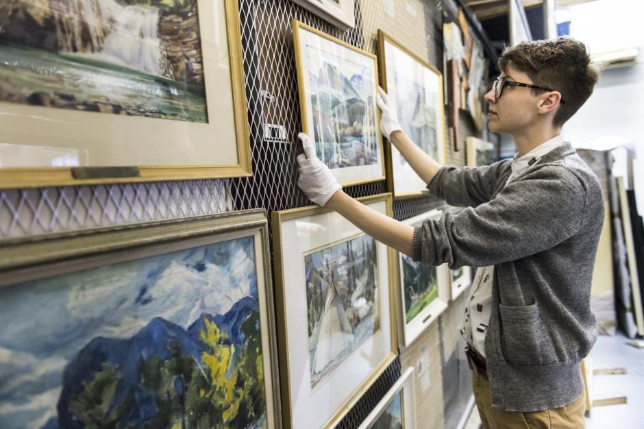 A practicum student works in the Walter Phillips Gallery