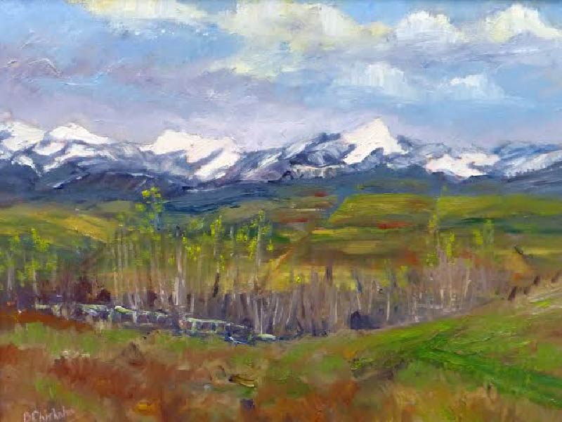 Painting of prairie and mountain landscape