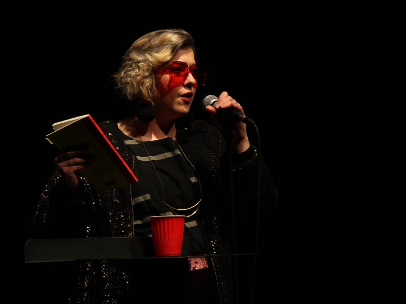 A photo of Nikki Reimer on stage
