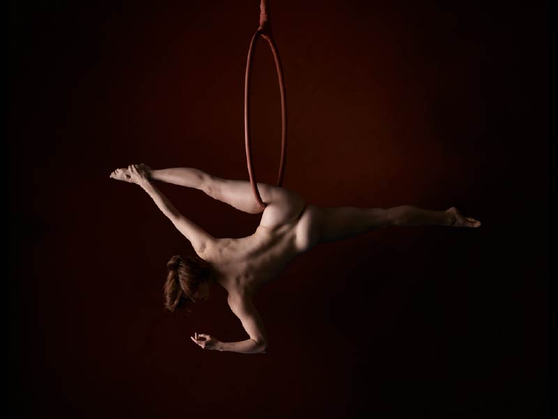 A photo of Sarah Curts performing aerial arts