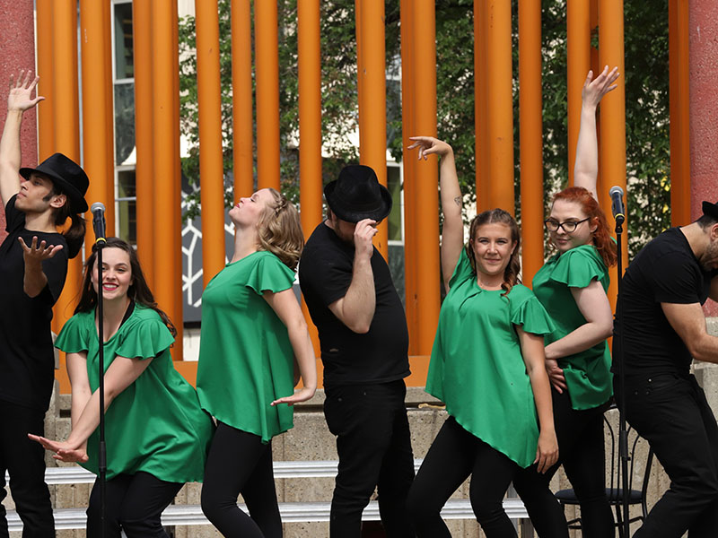 Youth Singers members perform in Olympic Plaza