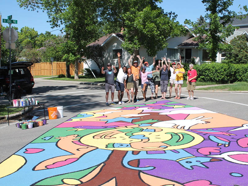 Crescent Heights Community Association shows off a mural on the the corner of 8th Avenue and 1st Street NE
