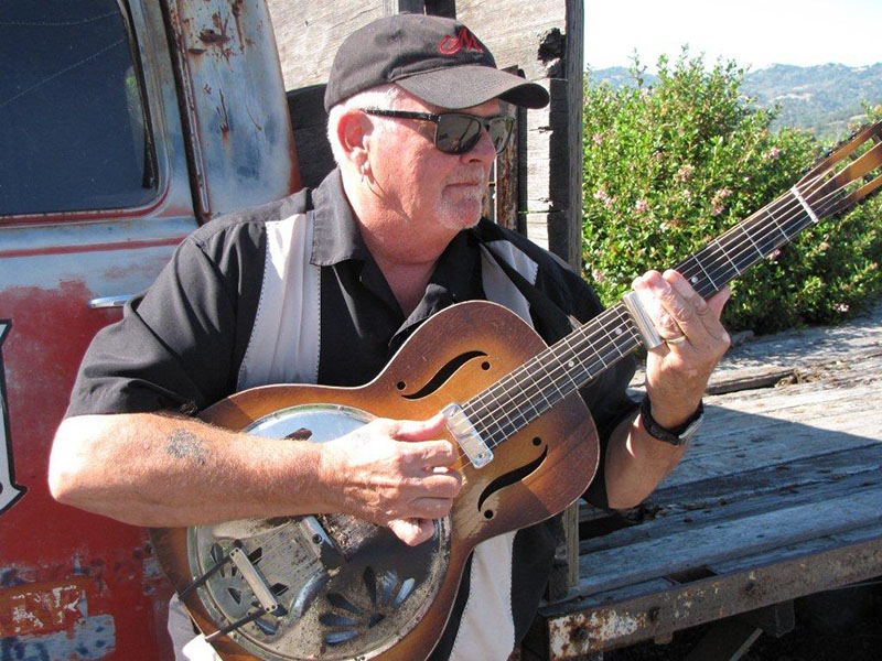 Tim Williams playing guitar