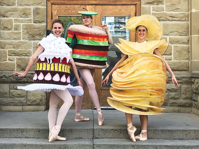 Dancers in food costumes