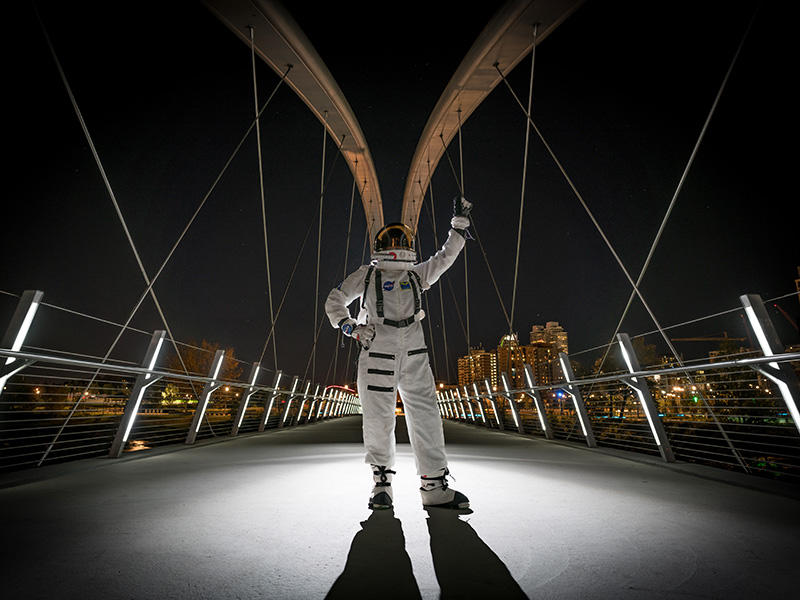 A photo of an astronaut on the Skipping Stone Bridge