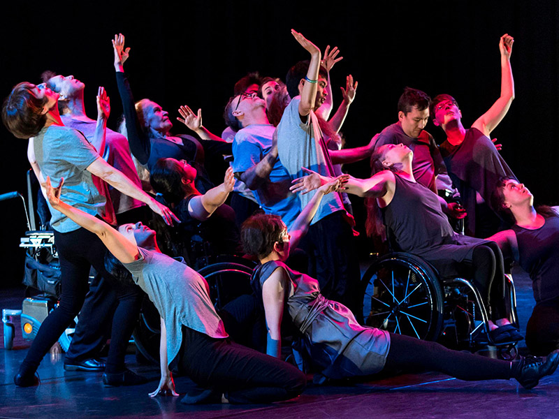 Mixed ability performers on stage