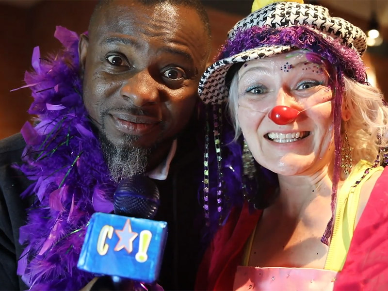 Lanre Ajayi and a clown performer at the Calgary Clown Festival