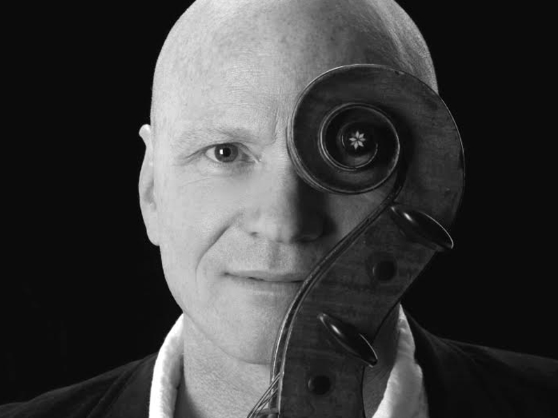 A photo of Phil Hansen and his cello