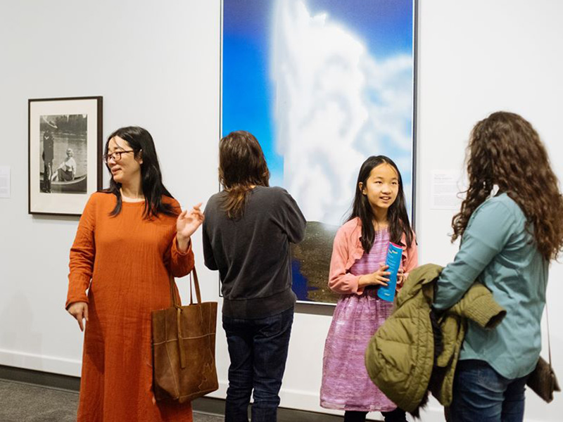 Visitors explore a gallery at Glenbow during Free First Thursday Nights