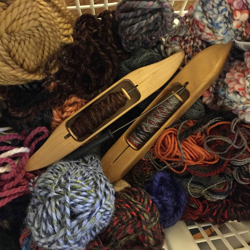 A photo of yarn and shuttles