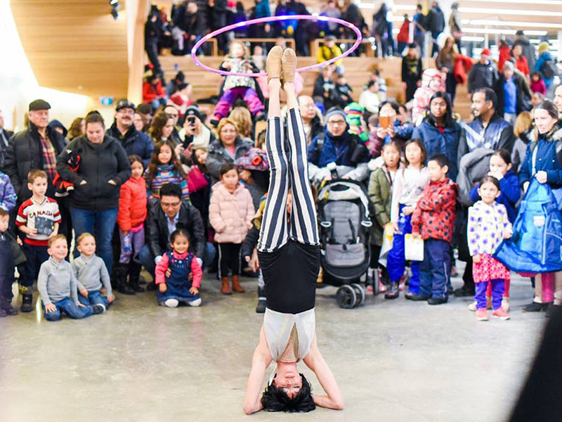 A circus performer at the Central Library