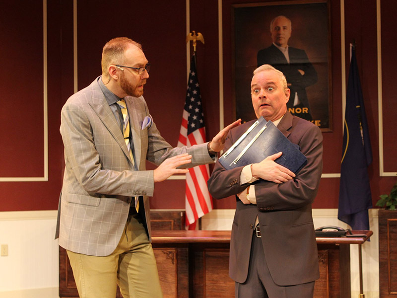 Cast members of The Outsider on stage