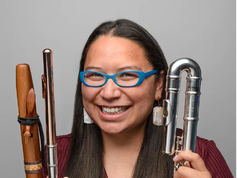 A photo of Jessica McMann with instruments