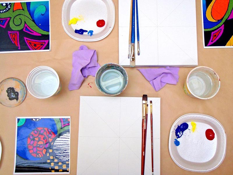 Image of table set with art supplies