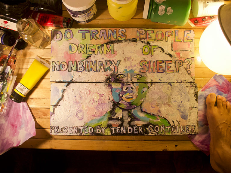 A piece of art that says, Do Trans People Dream of Nonbinary Sheep? Presented by Tender Container