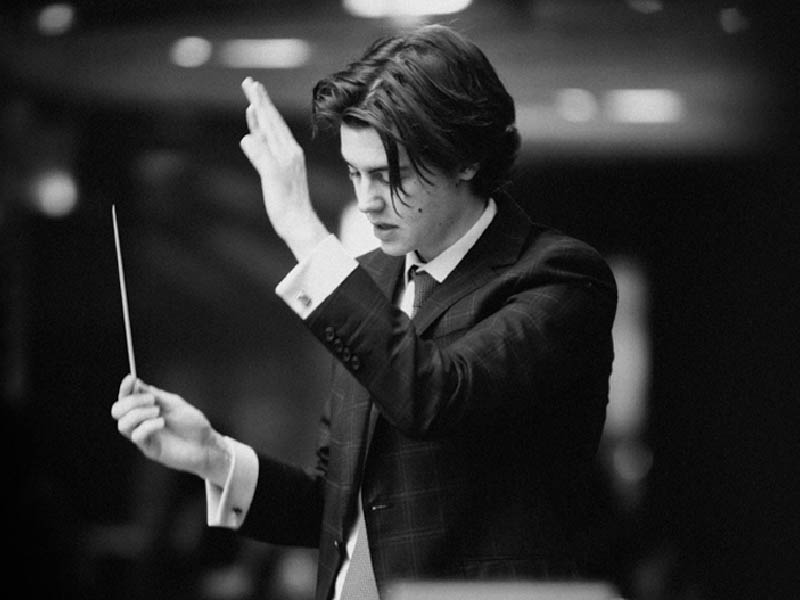 A black and white Image of a conductor