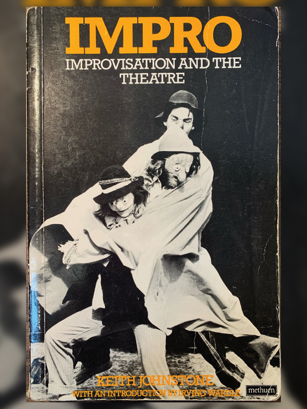 The cover of a black-and-white paperback book picturing three people onstage wearing hats and masks. The title is 'Impro: Improvisation and the Theatre' by Keith Johnstone.