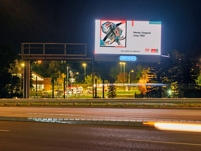 Photo of Billboard outside an LRT station at night, with artwork by Wendy Toogood - Loop