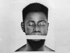 A black-and-white hyperrealist drawing of a person face with a white strip covering their mouth, by Alexander Akhere Oriaifo