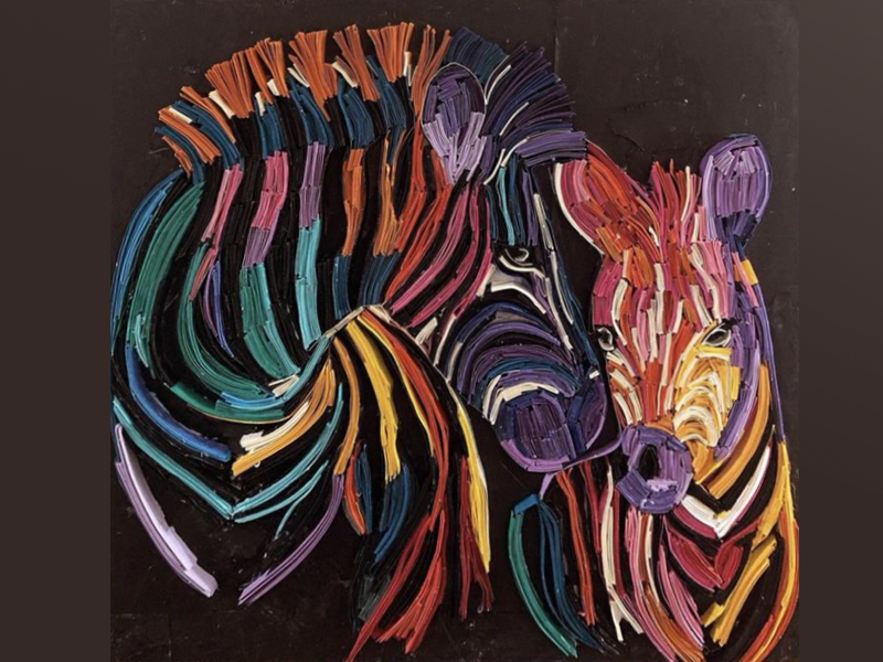 A multicolour quilling piece of two zebras, one who appears to be the mother looking at the baby zebra, by Karine Nazaryan