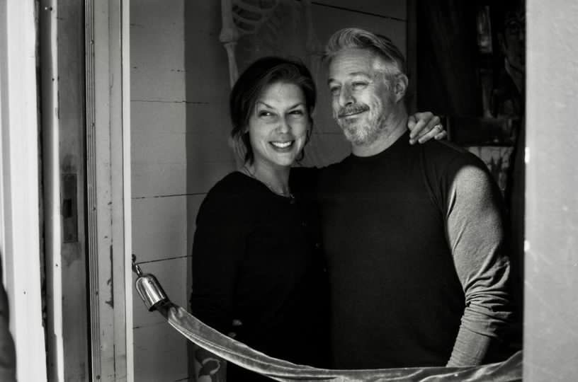 Rich and Jess Théroux standing in a doorway