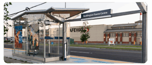 A digital reproduction of artwork byLux McLeod and Jasneet Pritam at a BRT station