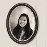 A photo of Jessica Cheng in black and white hanging on a wall