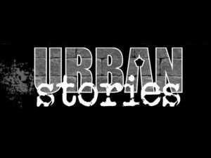 Black, grey and white logo reading Urban Stories