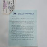 A typed letter of support for Citizen of the Century for Mr. Tom Baines on blue paper
