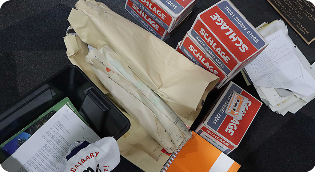 Various contents of the time capsule including boxes and tape cassettes etc.