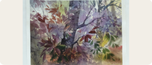A delicate watercolor painting of autumn foliage. The composition features overlapping branches with leaves in shades of green, yellow, red and purple. The background is softly blurred, suggesting depth and sunlight filtering through a forest.