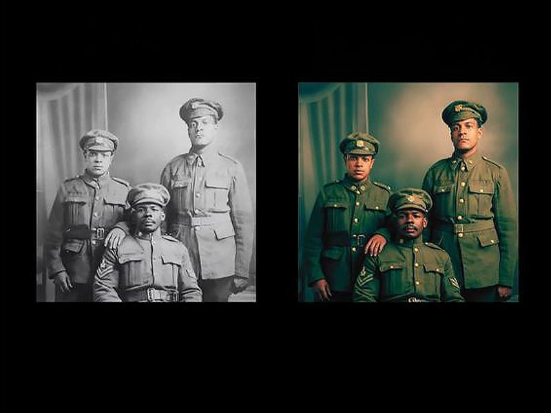 Side-by-side images: left - a black and white photo three soldiers from the early 1900s, one sitting, the other two standing behind, all posing for the photo. right image is the same photo but in colour with army greens